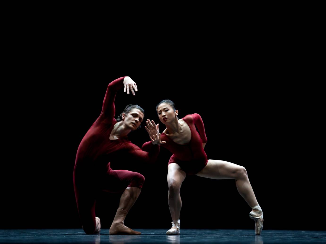 Semperoper Ballett Dresden's Pavel Mosqvito and Duosi Zhu in Neue Suite. Photo: Costin Radu.